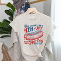 You Look Like 4th of July graphic tee featuring a hot dog illustration on a heather prism natural background.