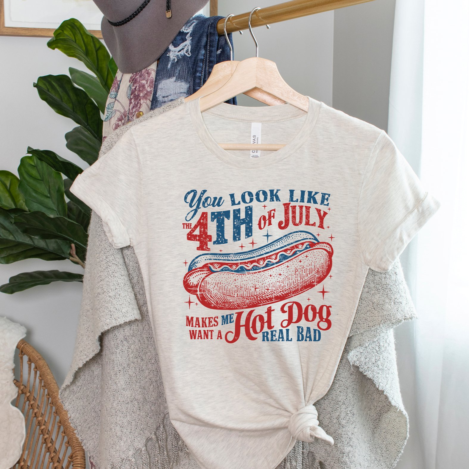 You Look Like 4th of July graphic tee featuring a hot dog illustration on a heather prism natural background.