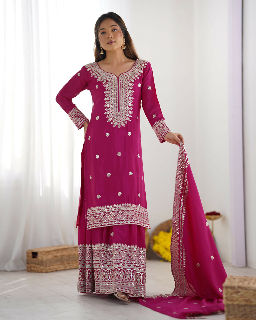 Elegant Pink Silk Kurta Set with intricate sequins, zari, and thread embroidery details.