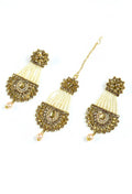 Golden jhumka earrings with kundan and pearl detailing and matching tikka