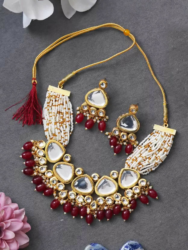 Maroon Kundan stone necklace set with gold plating