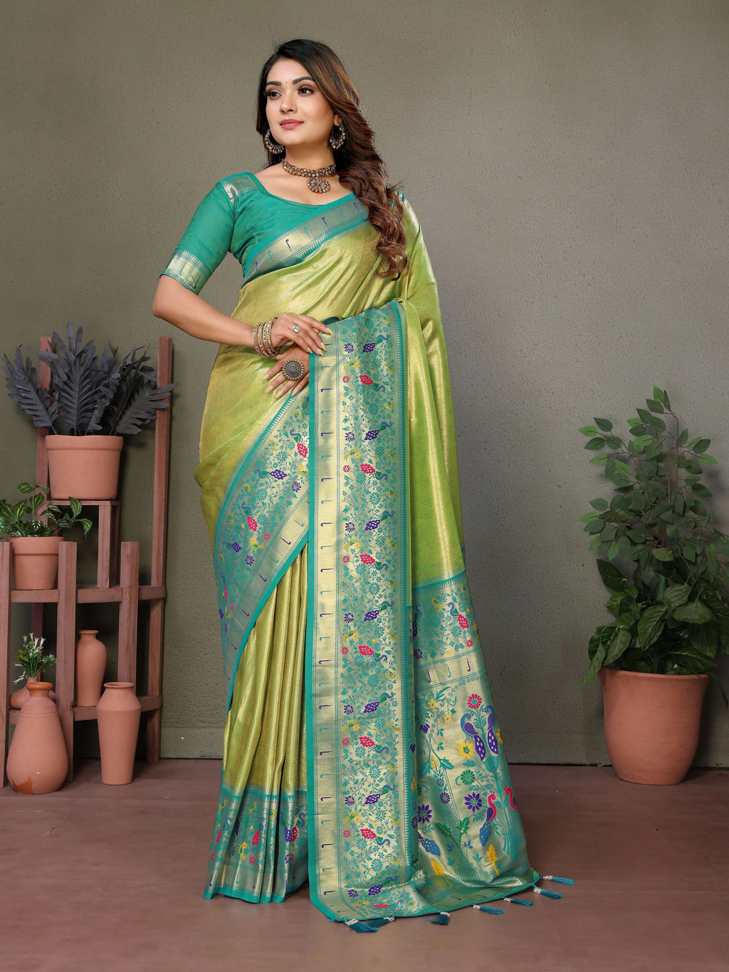 Pista color tissue silk saree with intricate traditional Paithani weaving detail