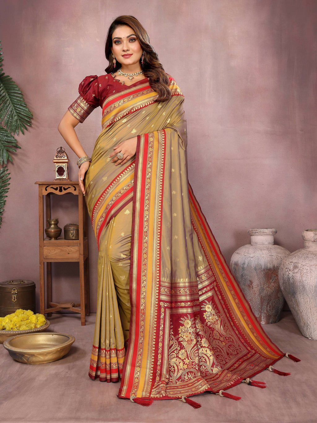 A beautiful Khaki Kalamkari Silk saree with intricate weaving patterns draped gracefully.