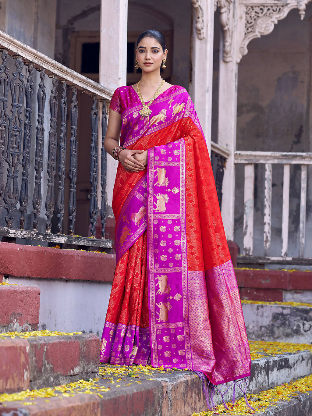 Shree Shyam Fashion red soft silk saree with a purple blouse draped elegantly