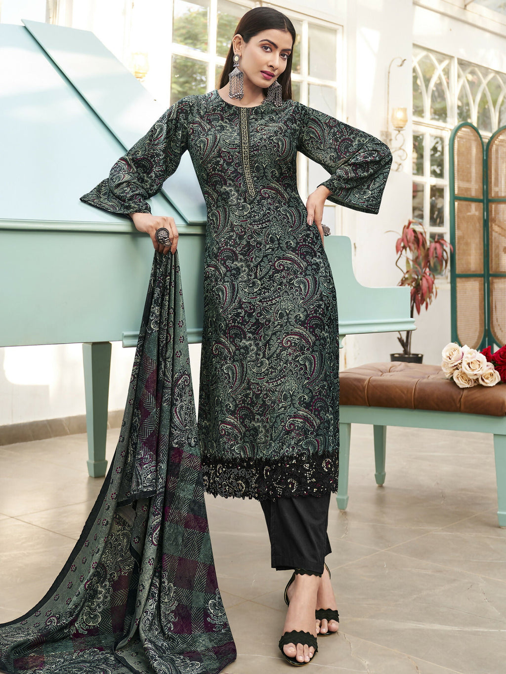 Close up of Green Velvet Kurta with detailed Resham thread embroidery and digital print.