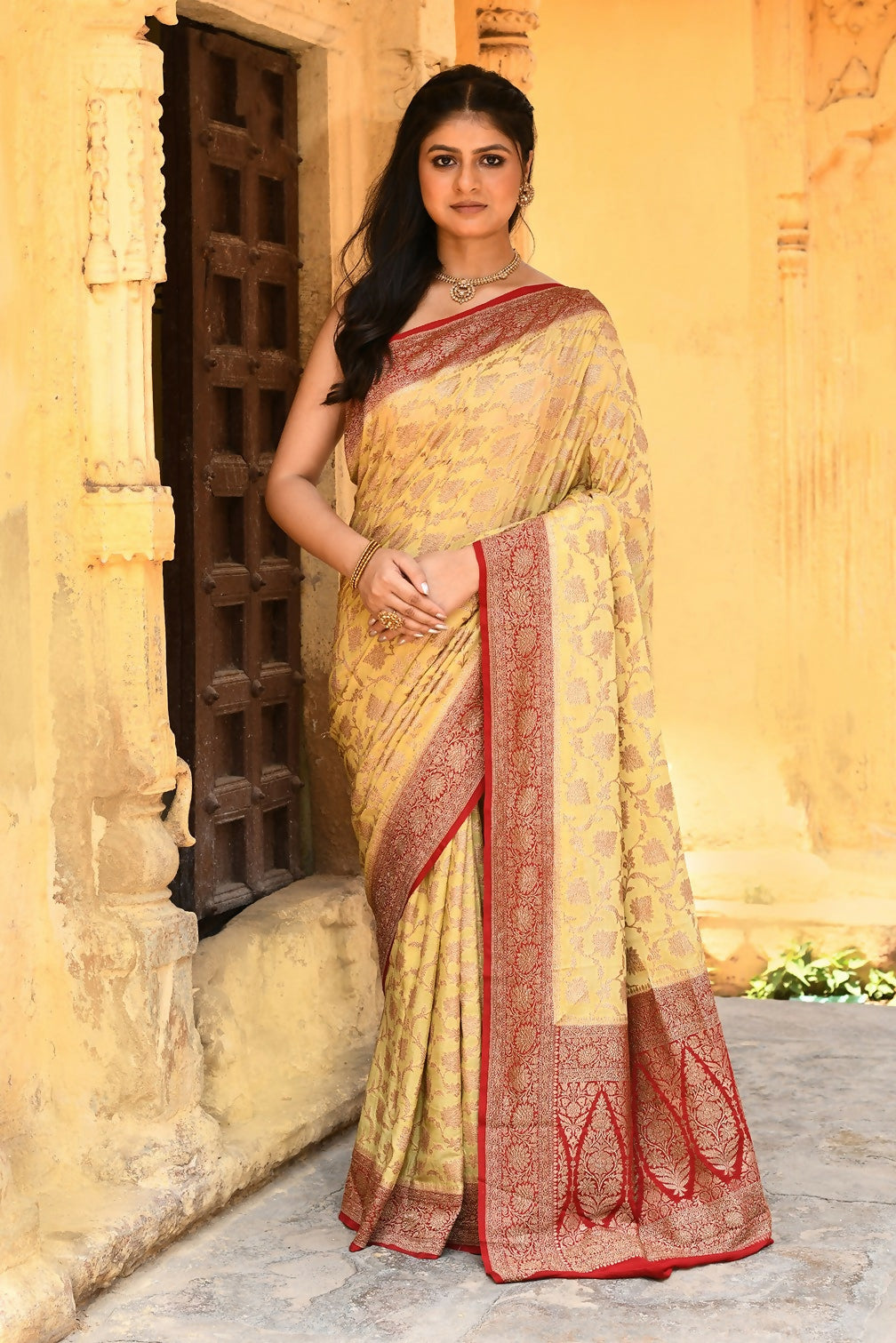 Bright yellow Crepe Chiffon handloom Banarasi silk saree