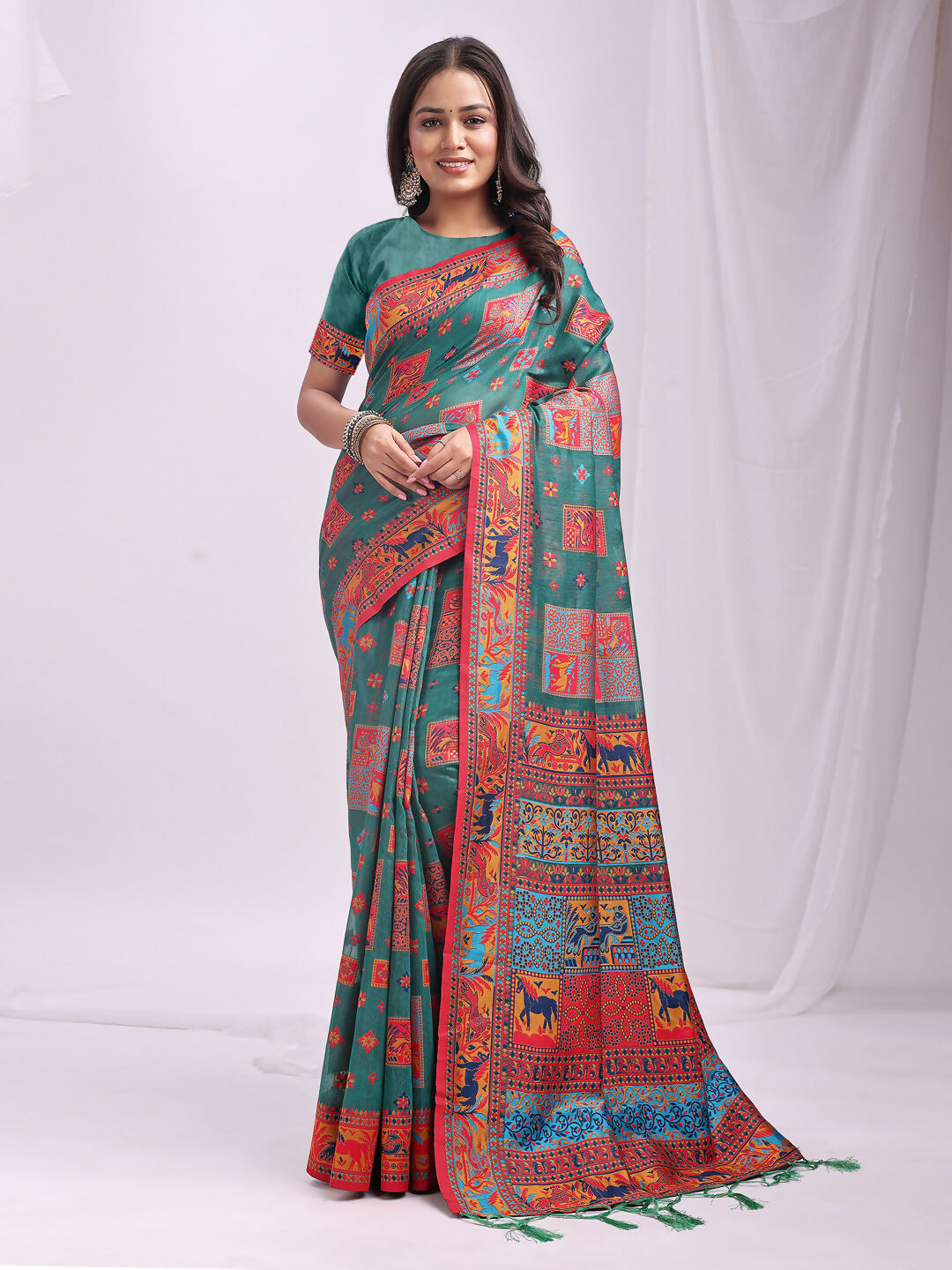 Woman wearing a Rama Green Linen Cotton saree with matching blouse piece