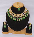 Elegant green Kundan stone necklace set with gold plating and adjustable cord