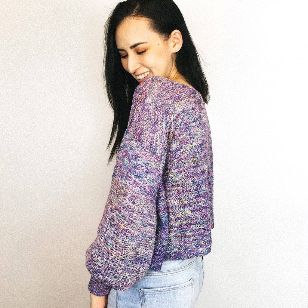 A beautiful hand-knitted Zephyr Tides Cardi made from luxurious lace weight silk yarn.