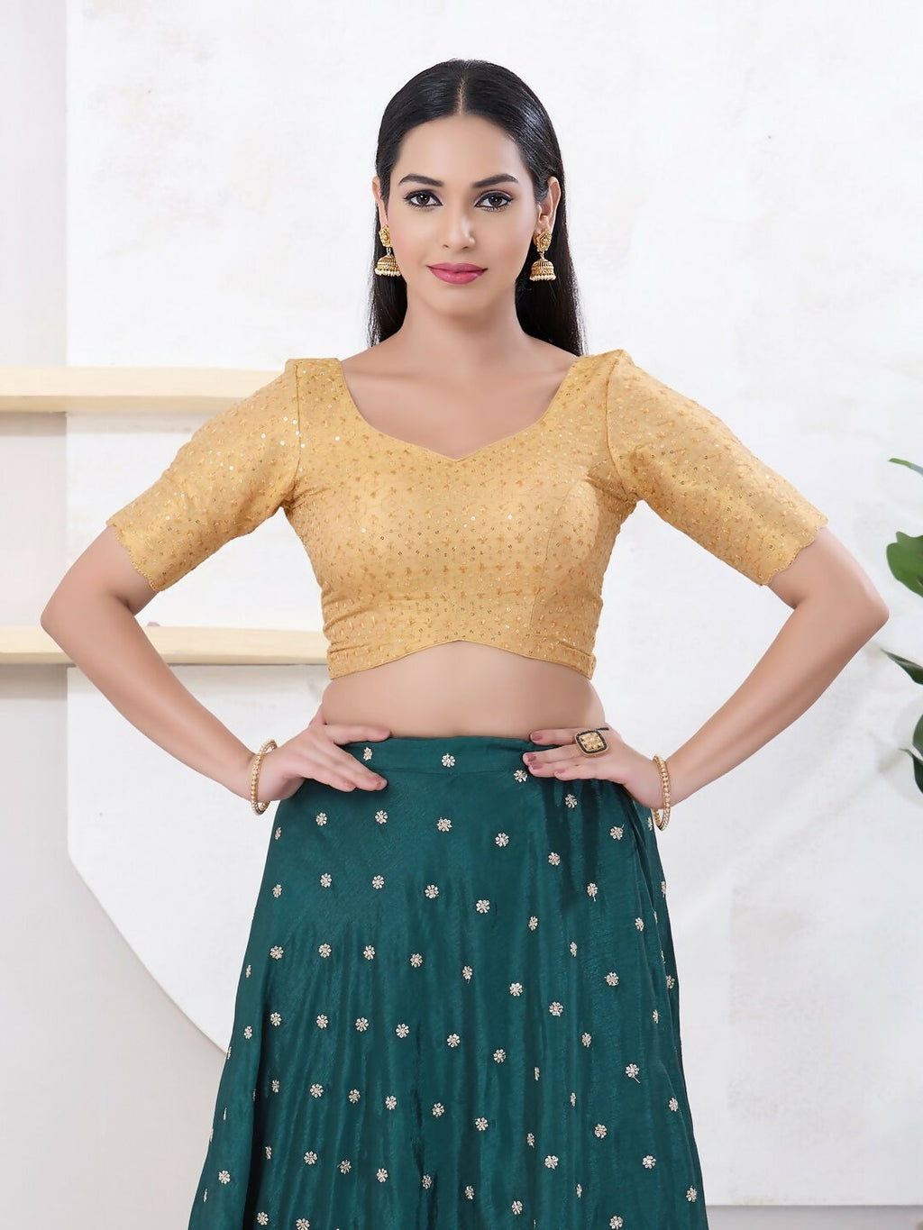 Gold Tissue fabric blouse with sweetheart neck and back open design