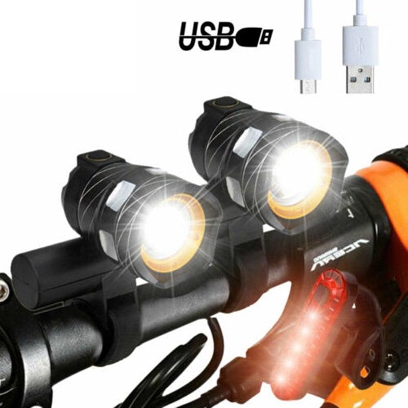 Zoomable black LED bicycle headlight with tail light and mounting brackets