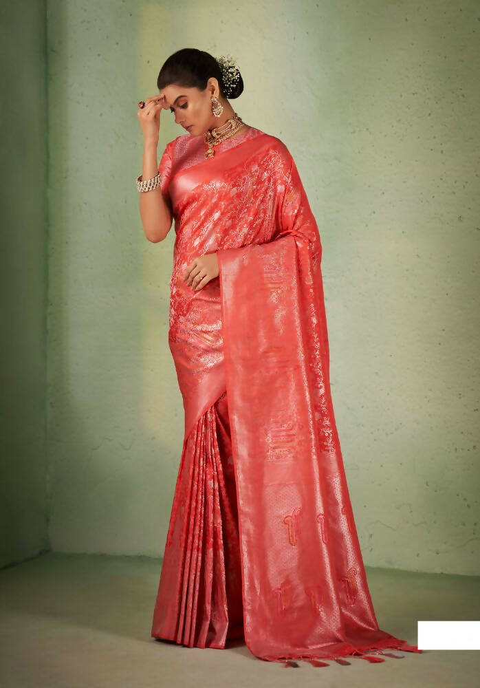 Tomato Red Kanjivaram Silk saree with intricate weaving and matching tassel detailing